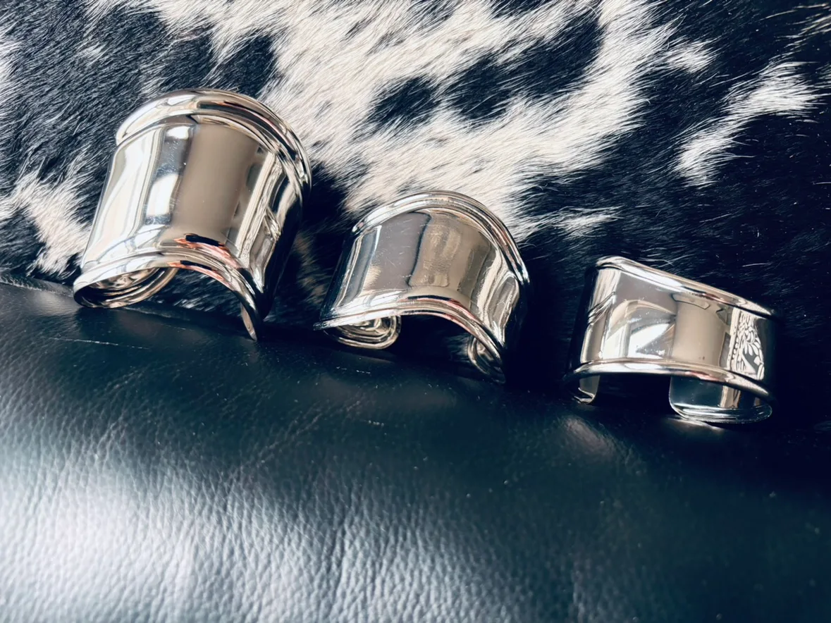 Set of 3 silver toned metal bracelets image indicator(3)