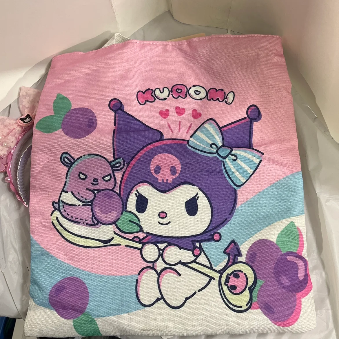 Kuromi tote bag filled with hair accessories, and bracelets image indicator(7)
