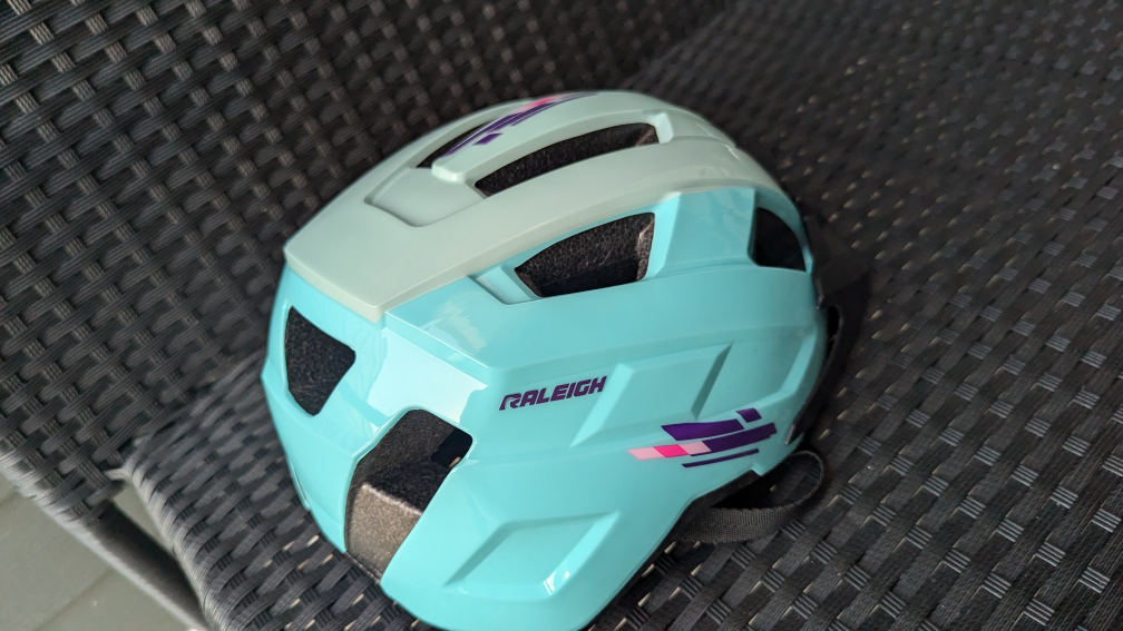 Raleigh Turquoise and Black Bike Helmet