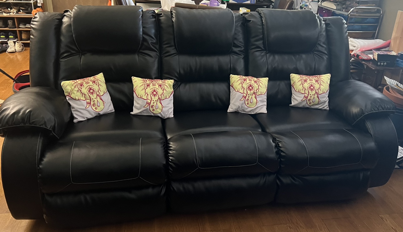 Black leather sectional living room set
