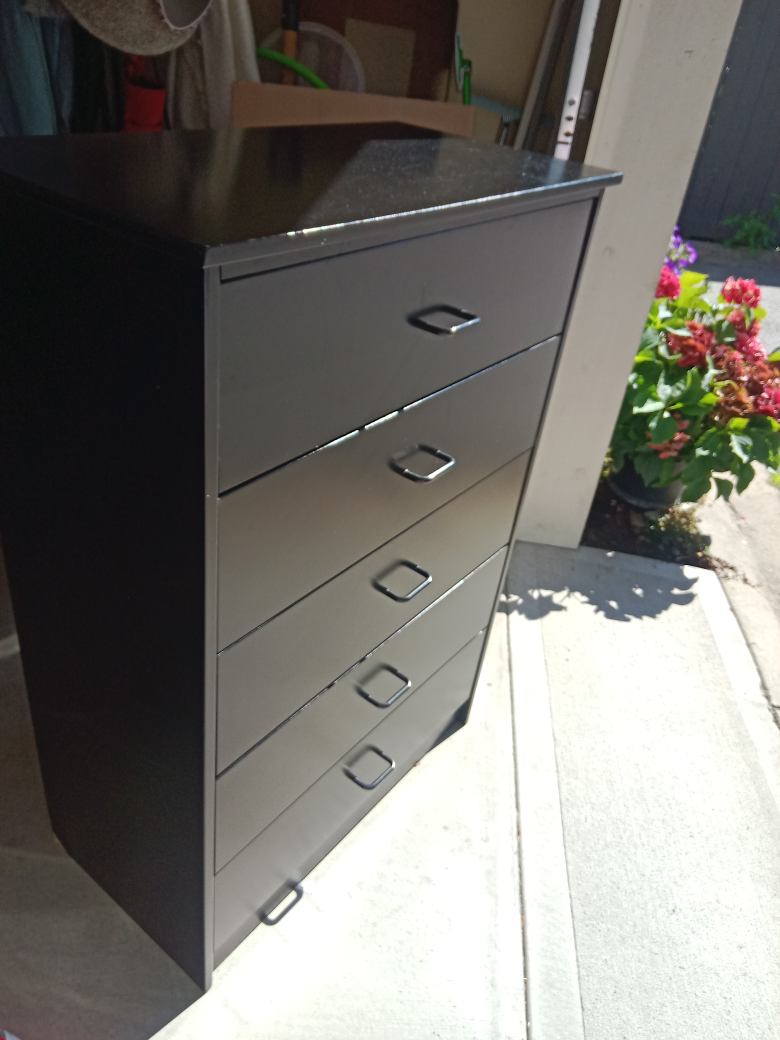 Black dresser with five drawers