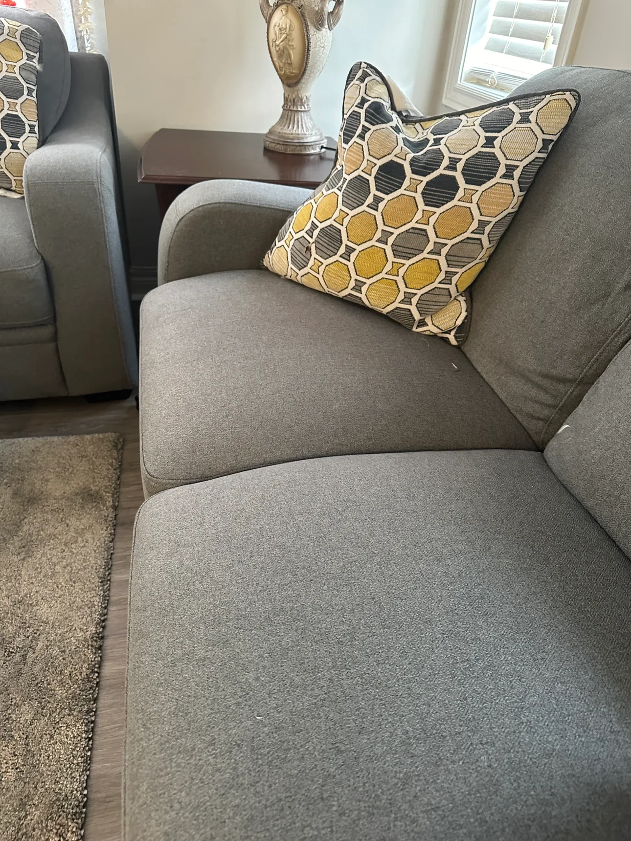 Grey Sofa excellent condition with Ottoman image indicator(5)