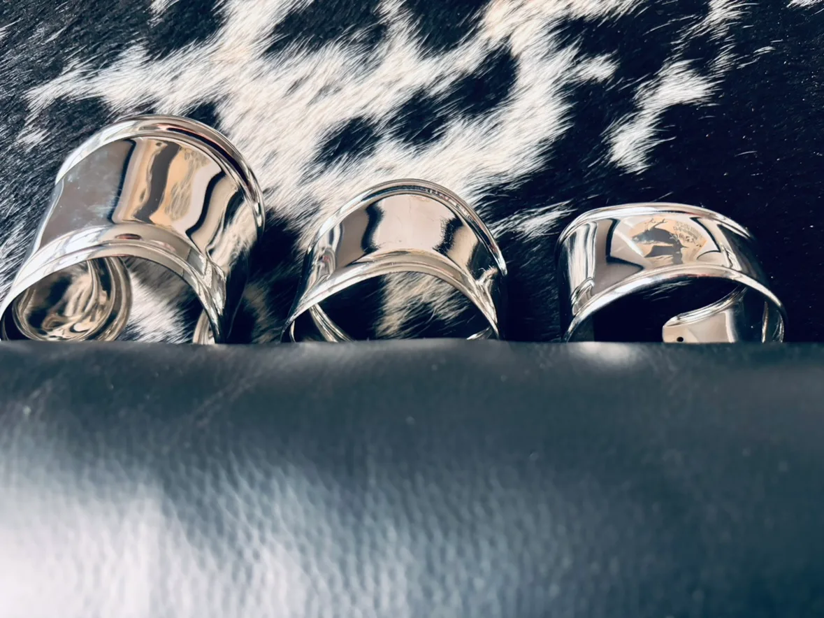 Set of 3 silver toned metal bracelets image indicator(4)