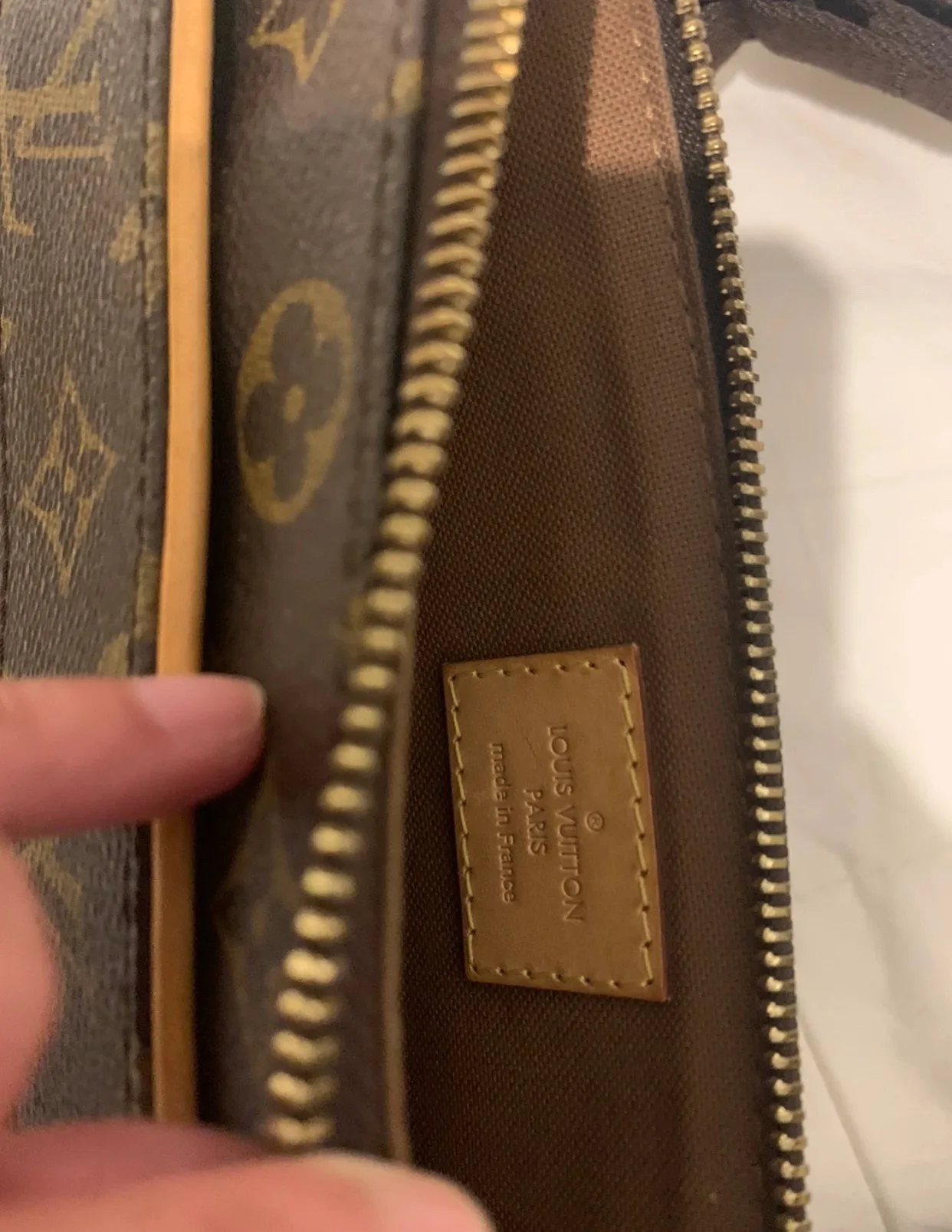 Authentic Louis Vuitton Pochette Valmy Crossbody Bag image indicator(6)