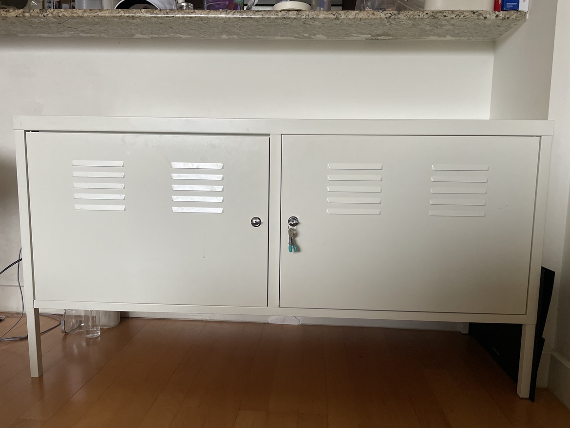 White Metal Cabinet with Doors
