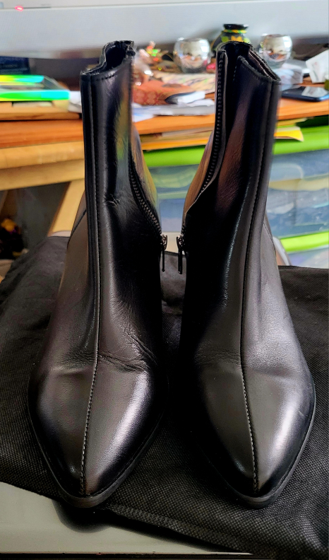 Black boots size 10.5 and 2" high very comfortable