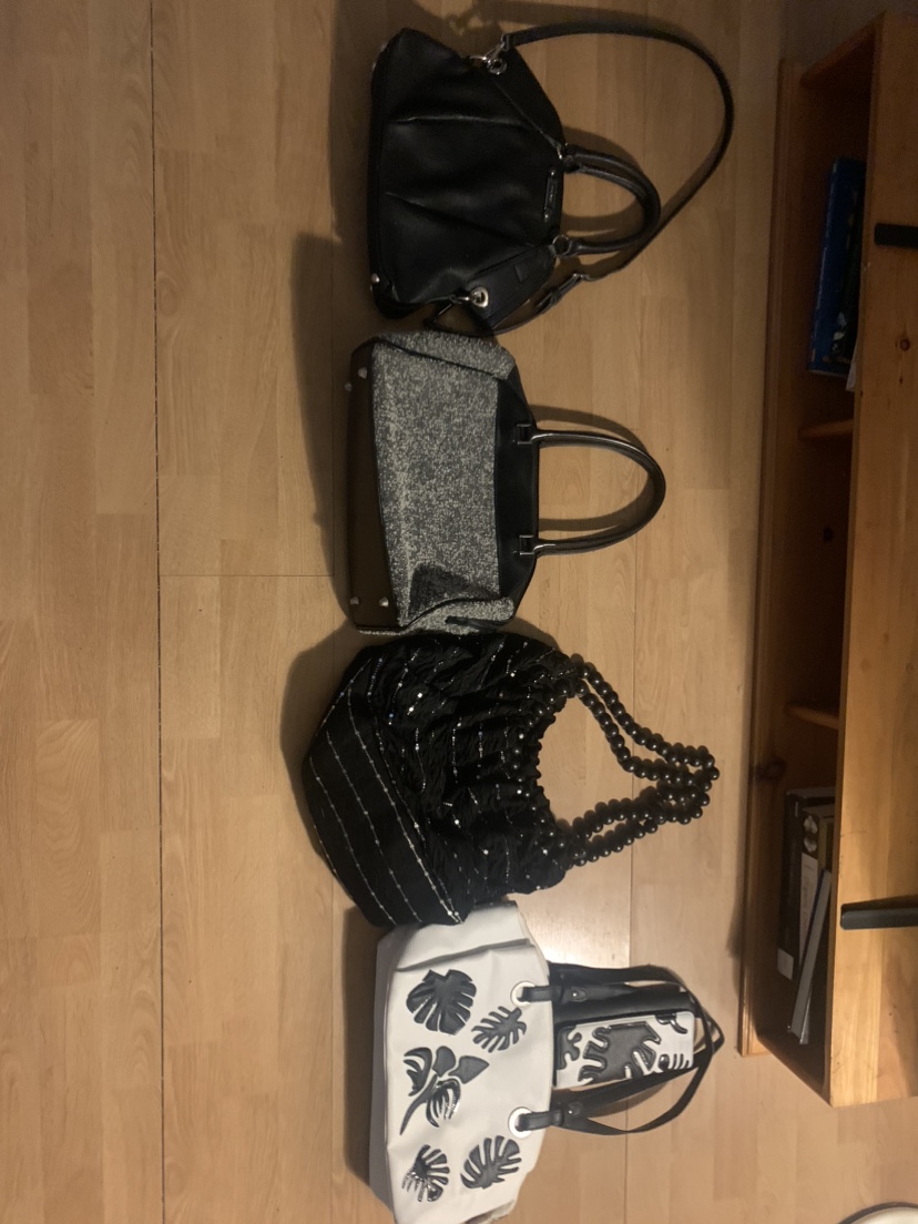 4 new handbags , one with matching wallet 20 for all 4