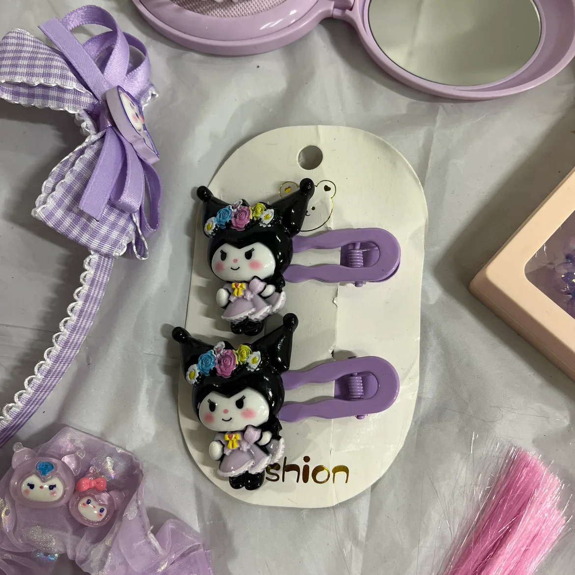 Kuromi tote bag filled with hair accessories, and bracelets image indicator(2)