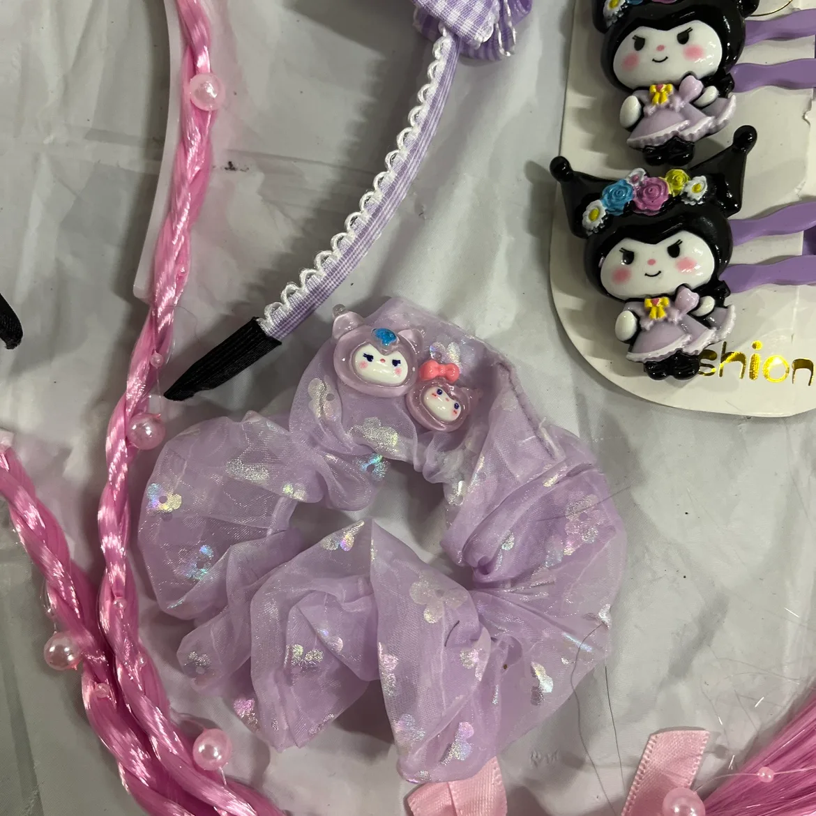 Kuromi tote bag filled with hair accessories, and bracelets image indicator(3)
