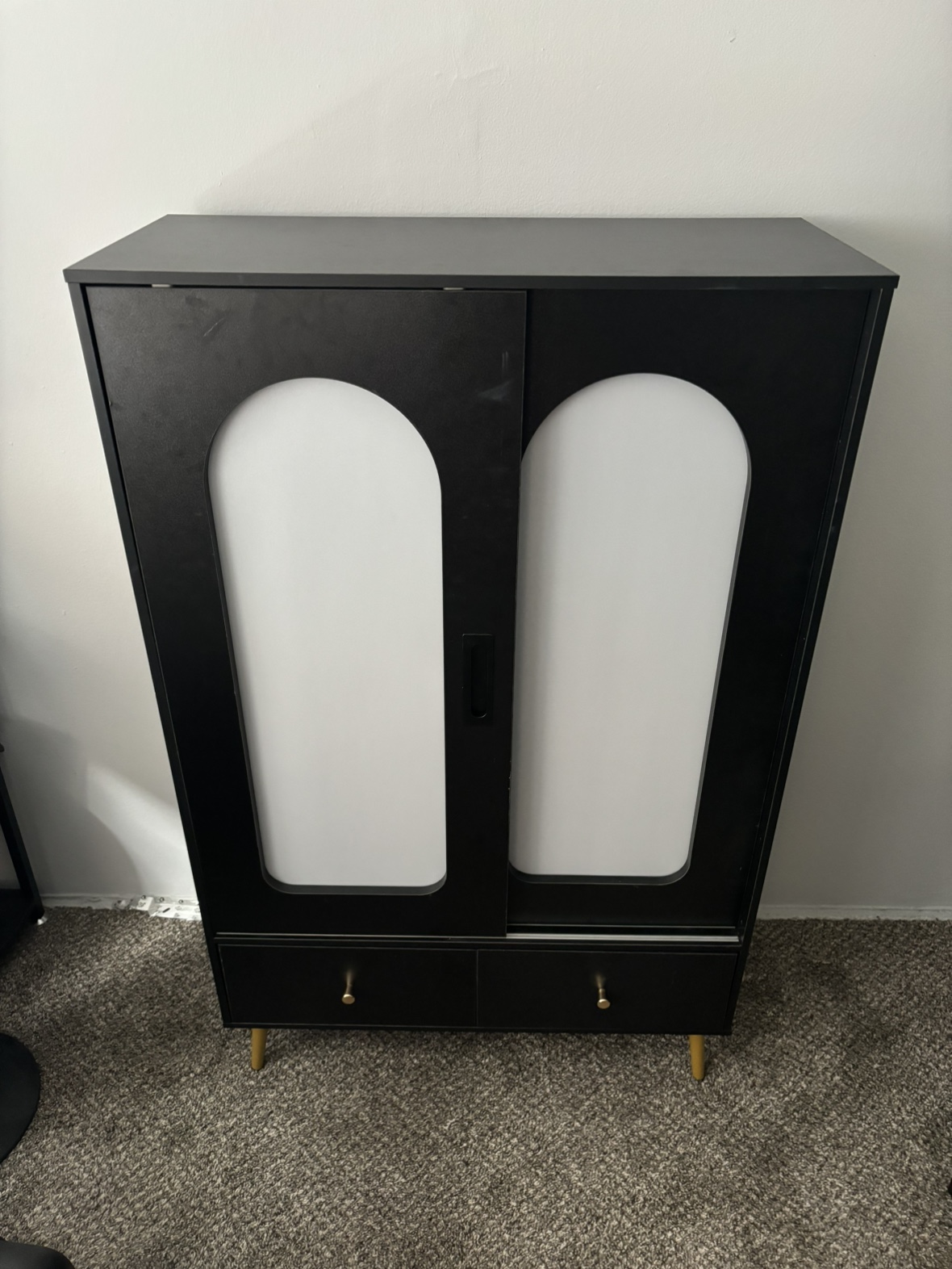 Black Arched Cabinet with Gold Legs