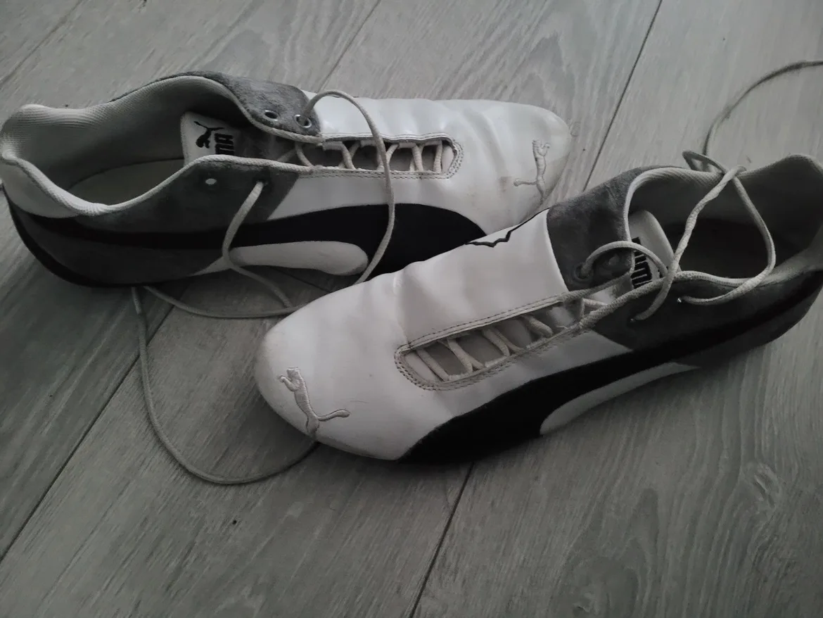 Puma shoes white with black logo image indicator(2)