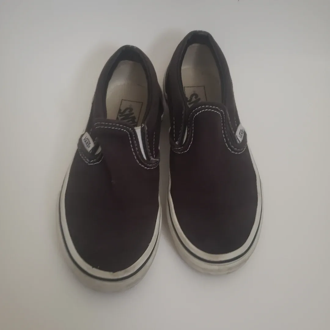 Black and white Vans Slip-On Shoes image indicator(2)