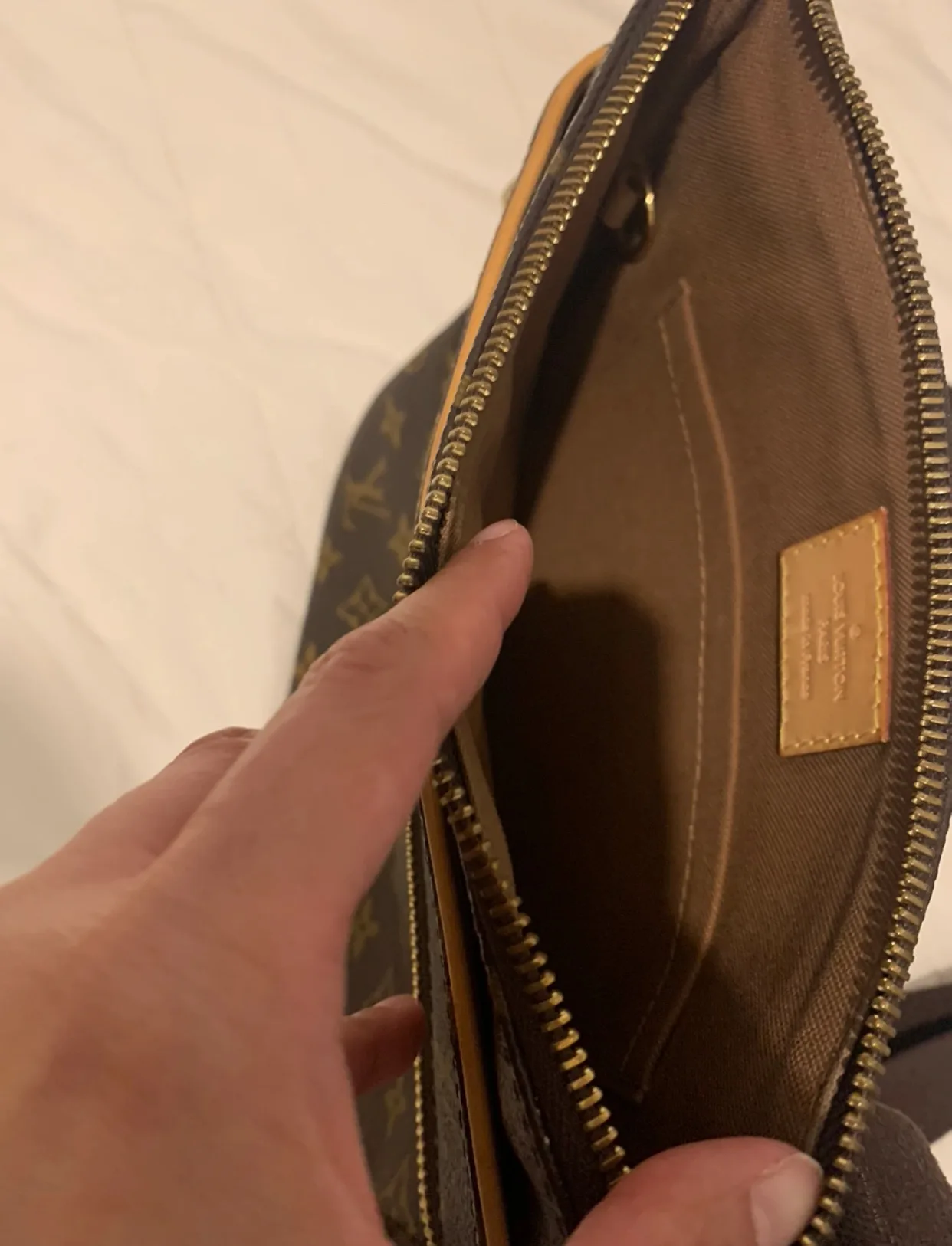 Authentic Louis Vuitton Pochette Valmy Crossbody Bag image indicator(5)