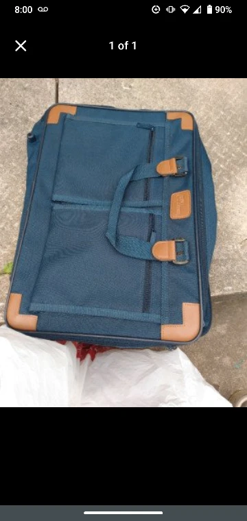 blue zippered weekend travel bag luggage