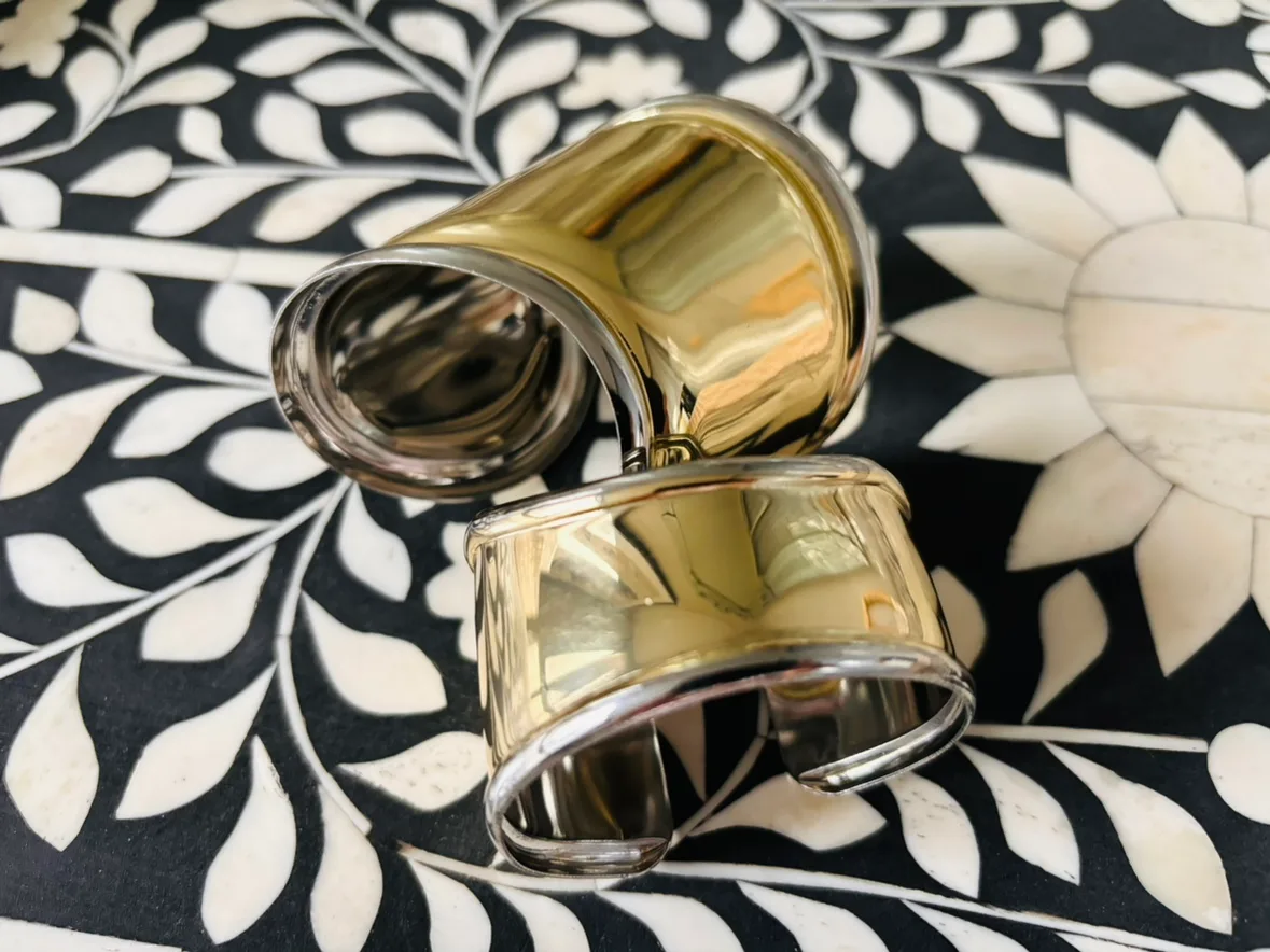 Set of 2 gold silver toned metal bracelets image indicator(2)