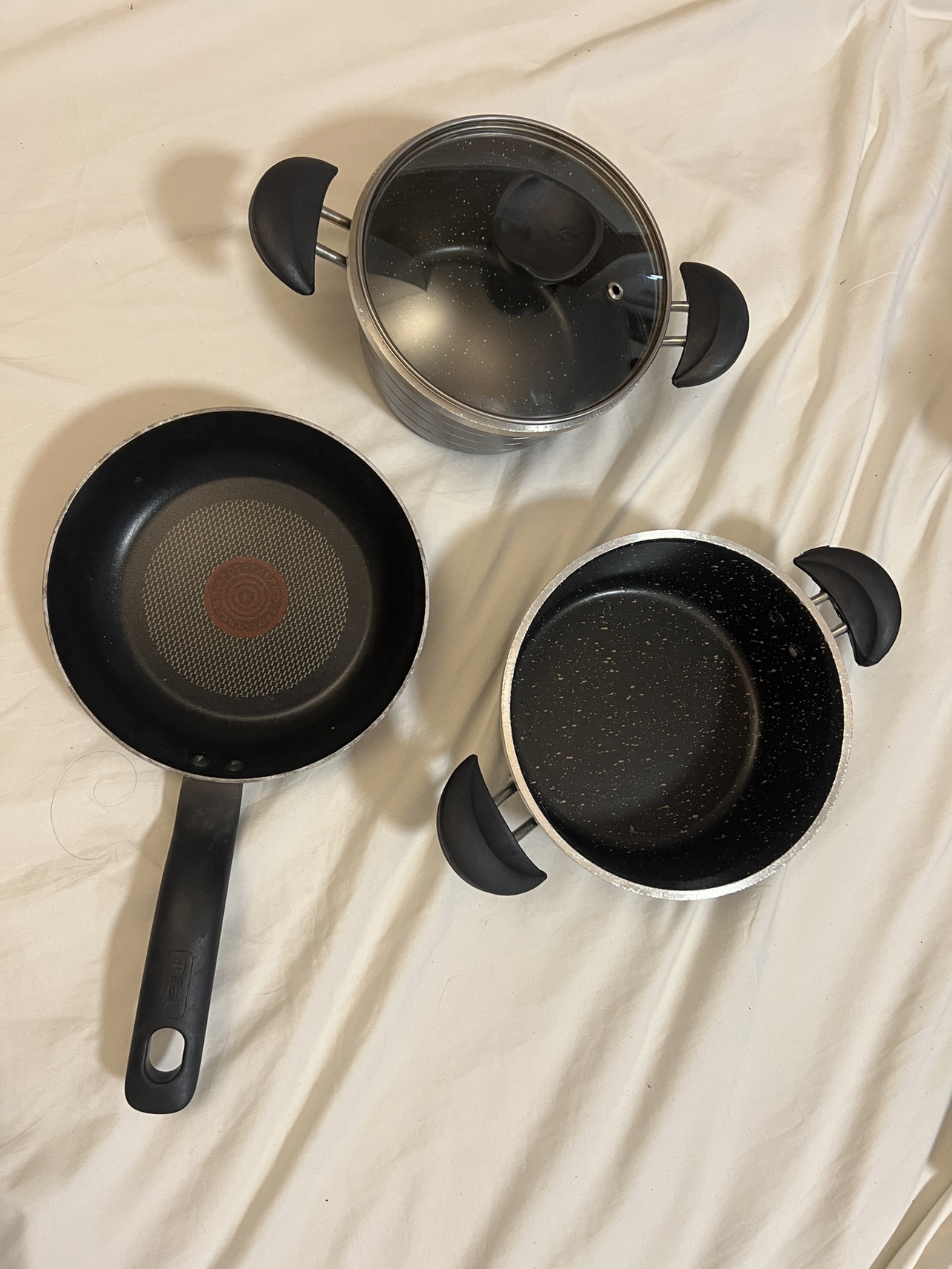 One small pot with lid and two pans (MOVING OUT SALE)