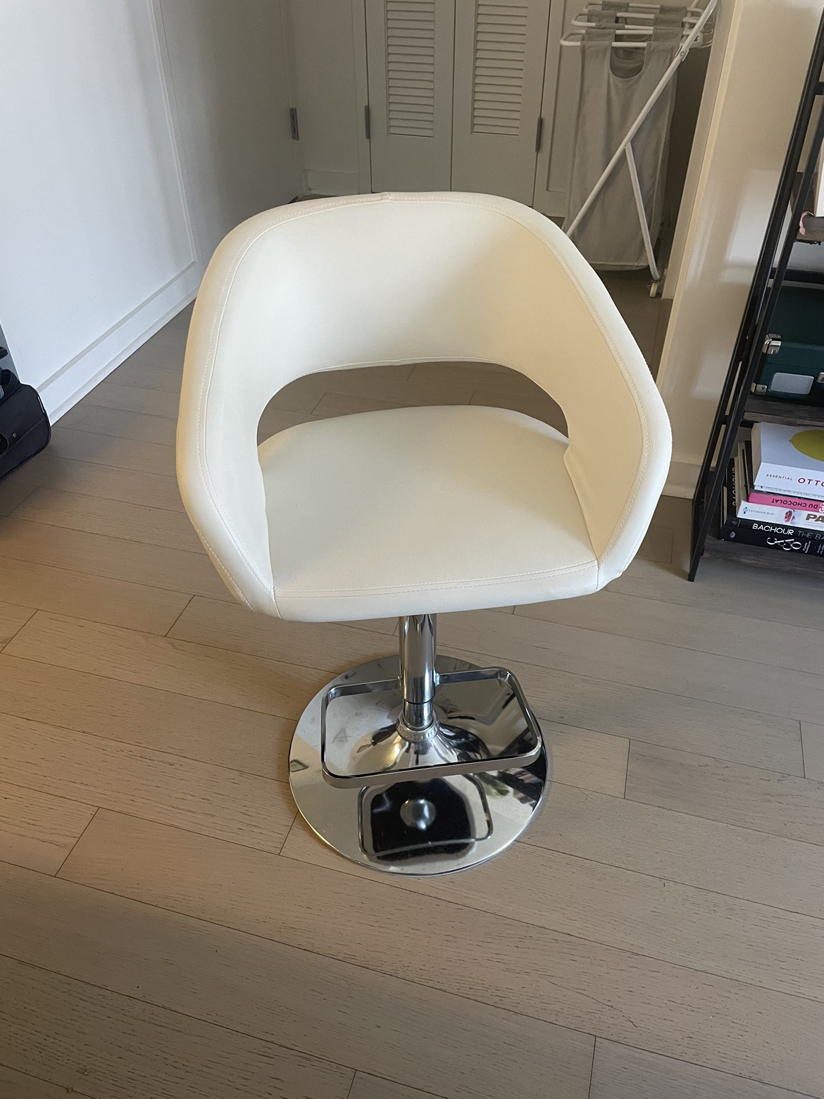 Two White Swivel Bar Stools