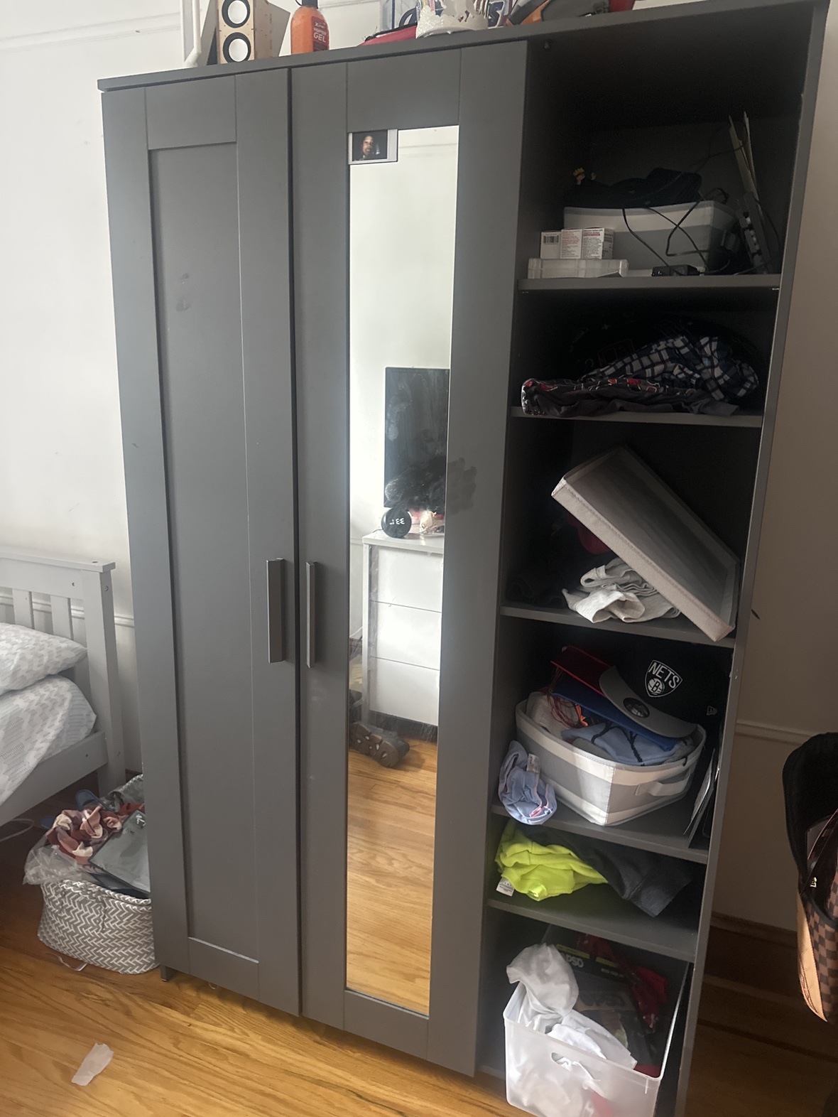 Gray Closet With Mirror