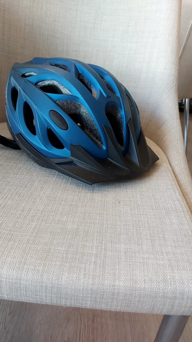 2 bike helmets, adult and youth thumbnail
