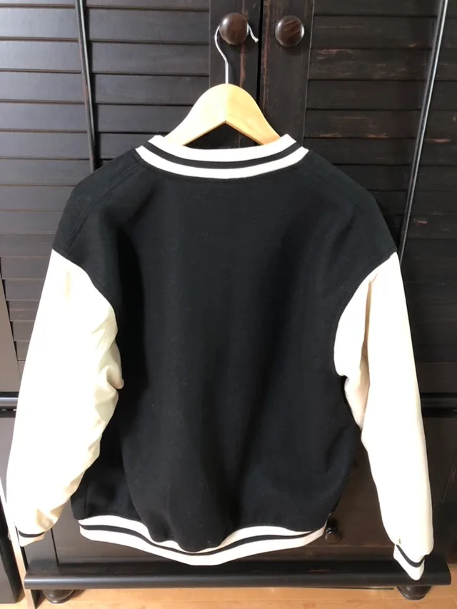 NEW H&M Divided Black and White Vegan Varsity Jacket image indicator(2)
