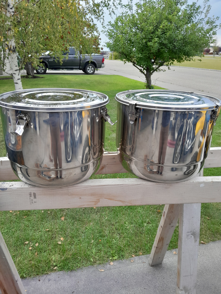 Two Stainless Steel Storage Containers