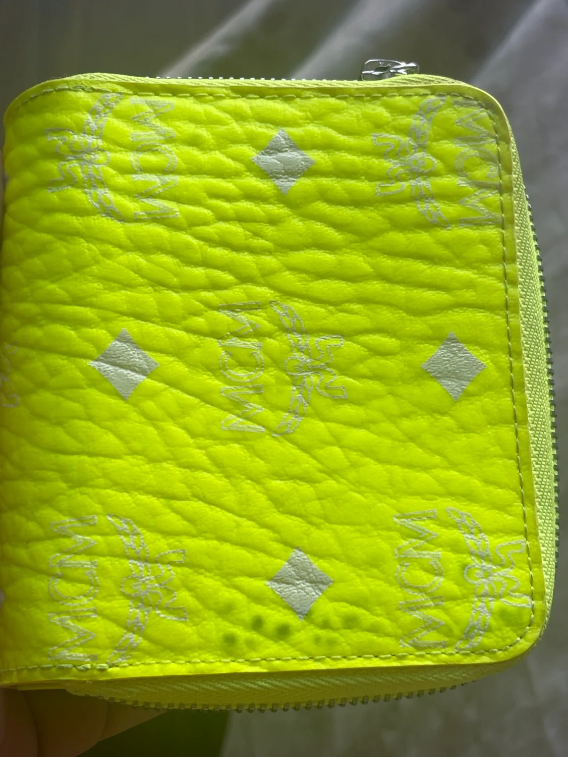 MCM Visetos Neon Yellow Zipper wallet image indicator(9)