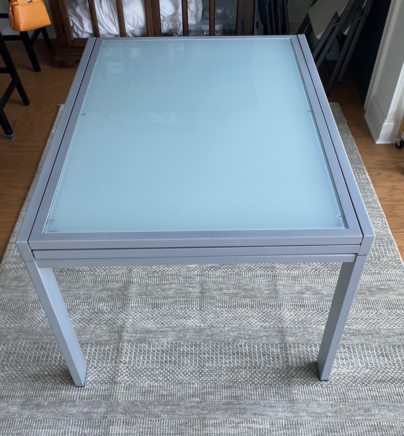 Extendable Glass Dining Table with Metal Frame