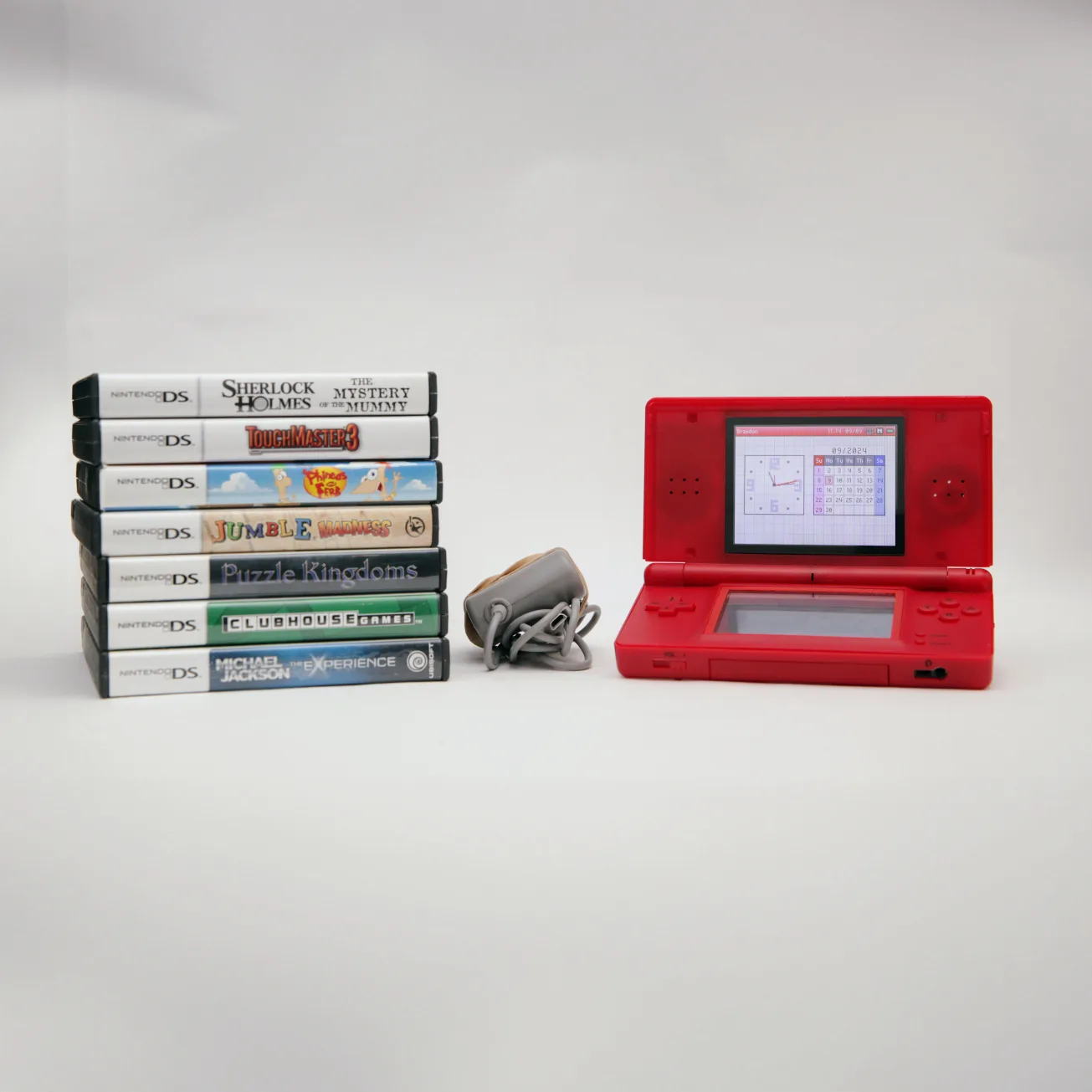 Nintendo DS Lite Bundle - Mario Theme + 7 Games + Charger thumbnail