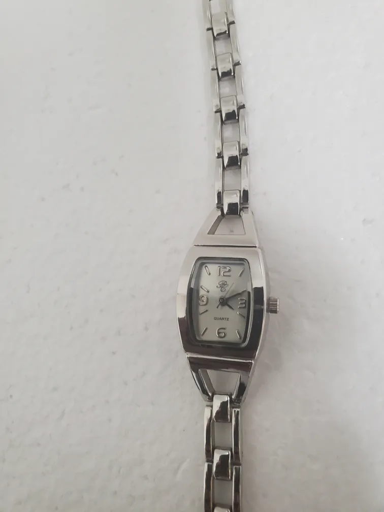 Women's Silver Watches:$6 each/both $10 image indicator(2)