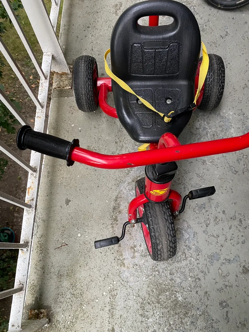 Red Tricycle thumbnail