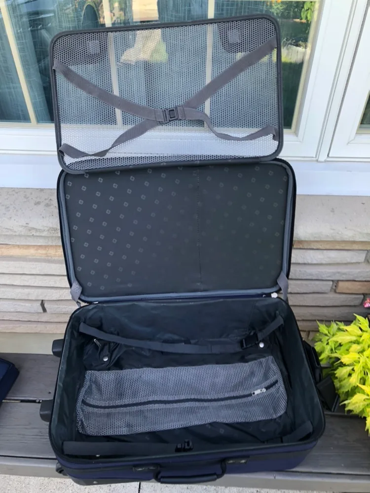 Carry-on Suitcase plus small blue tote bag image indicator(2)