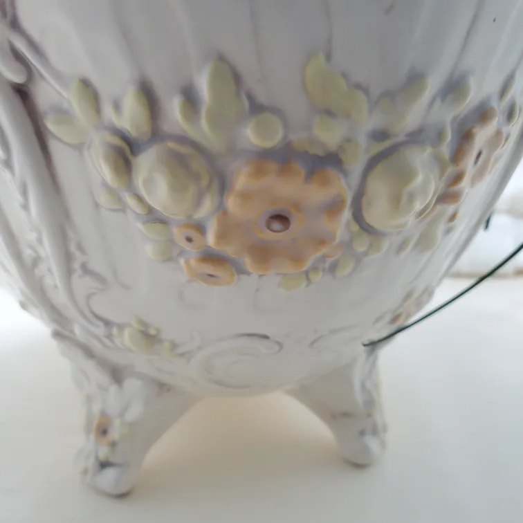 Artificial flowers in vintage planter image indicator(7)