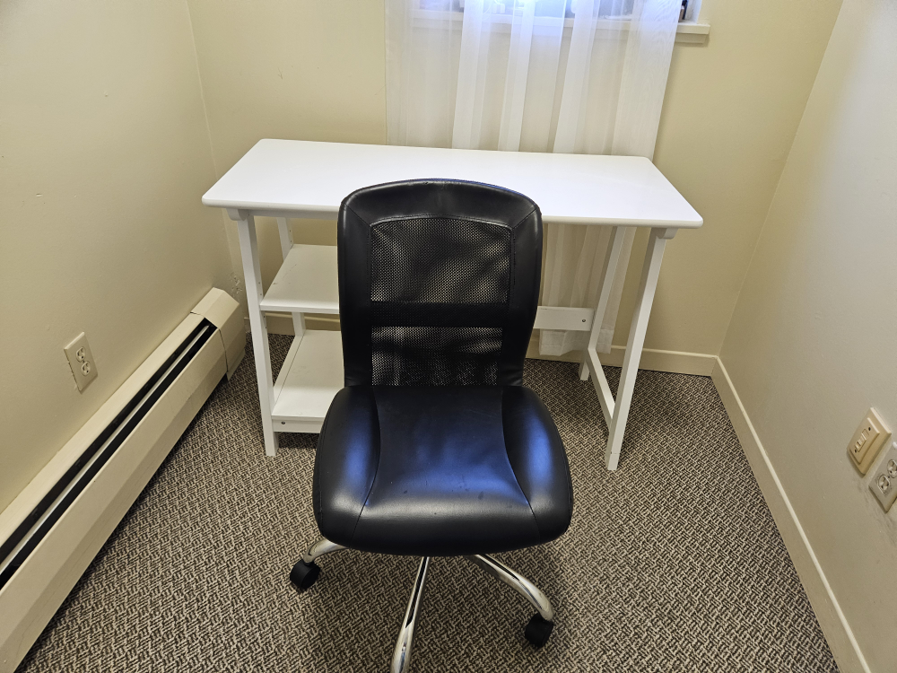 White Desk and Black Office Chair
