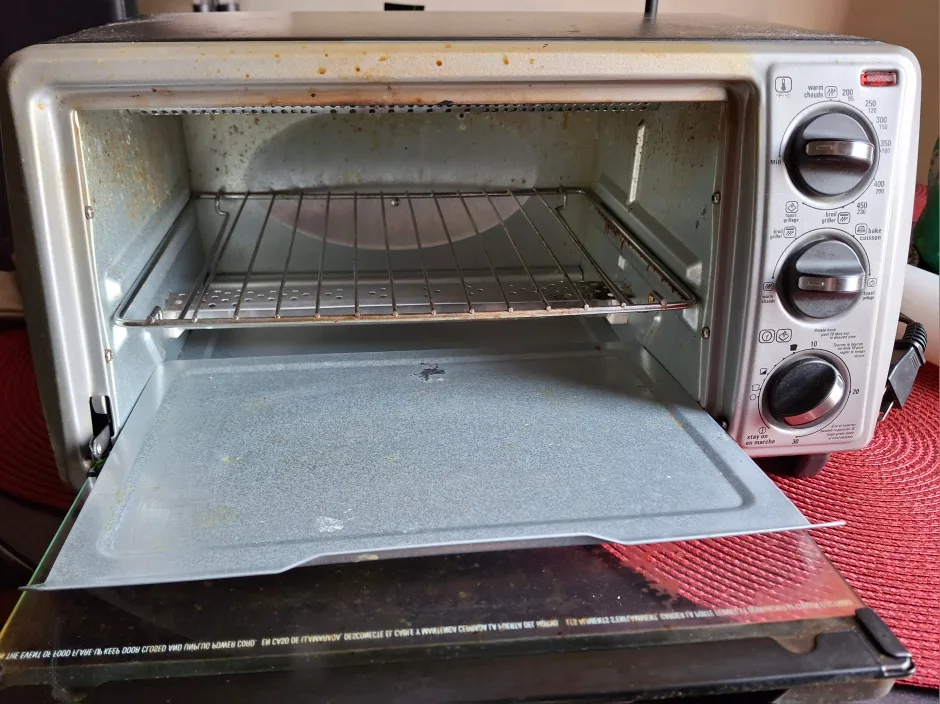 BLACK+DECKER 4-Slice Toaster Oven, Black image indicator(3)