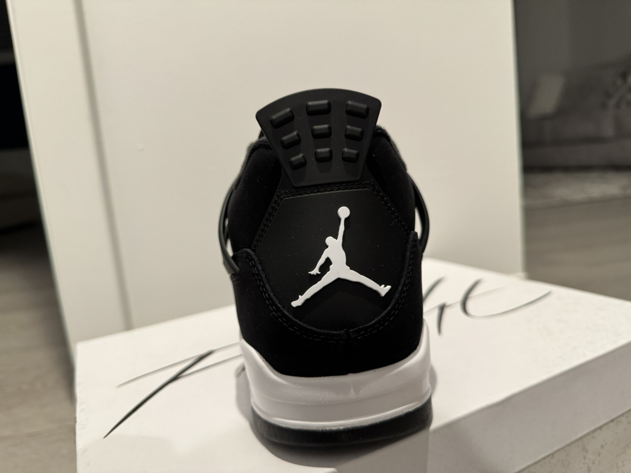 Air Jordan 4 Retro "Black Cat" - photo 4