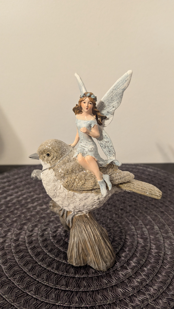 Fairy on Bird Figurine