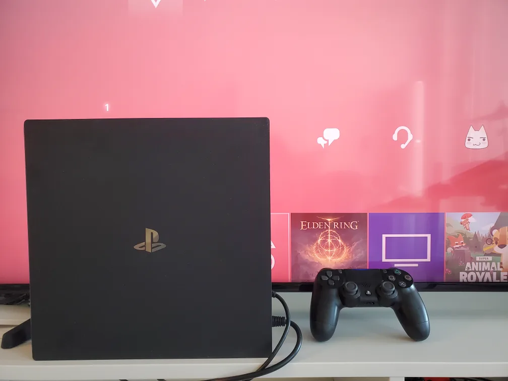 Play Station 4 Pro with controller thumbnail
