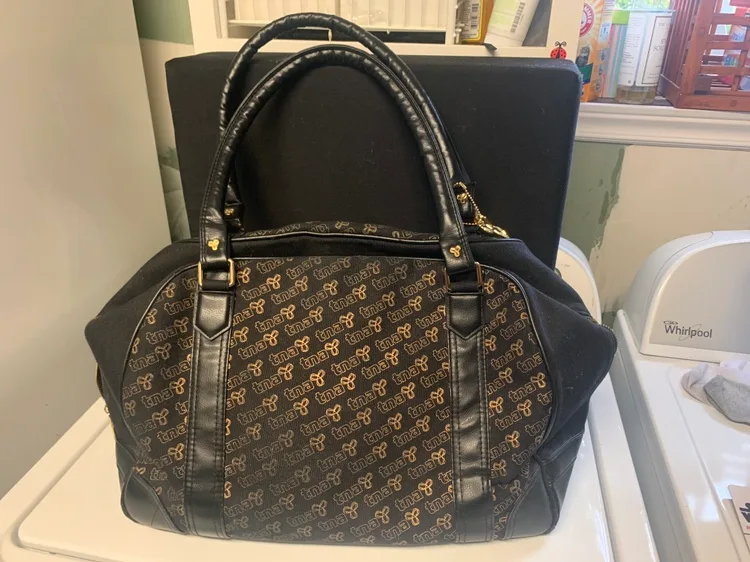 tna Black and Gold Weekender Bag image indicator(4)