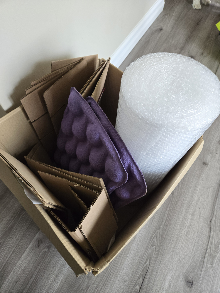 Box of Cardboard and Packing Materials