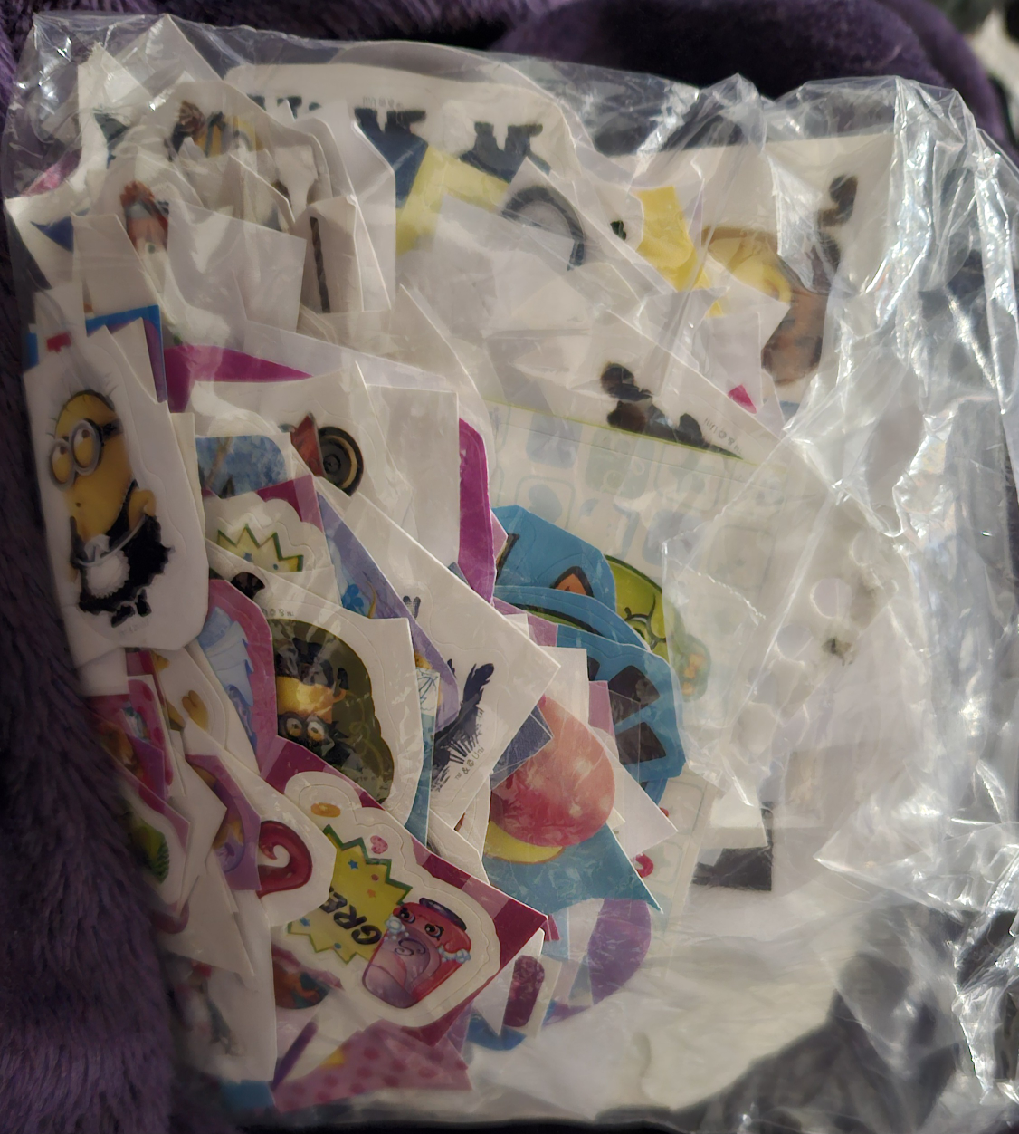 bag full of small stickers 🧡