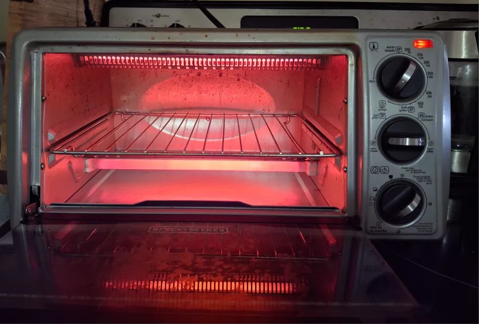 BLACK+DECKER 4-Slice Toaster Oven, Black image indicator(5)