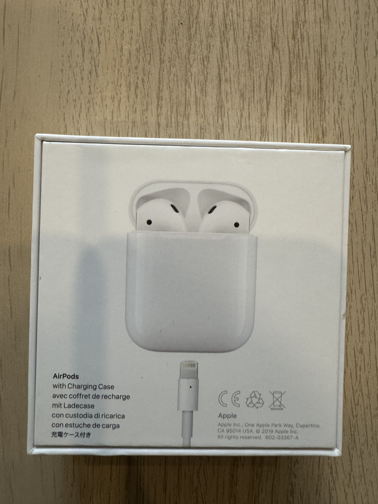 Apple AirPods with Charging Case, never used - photo 3