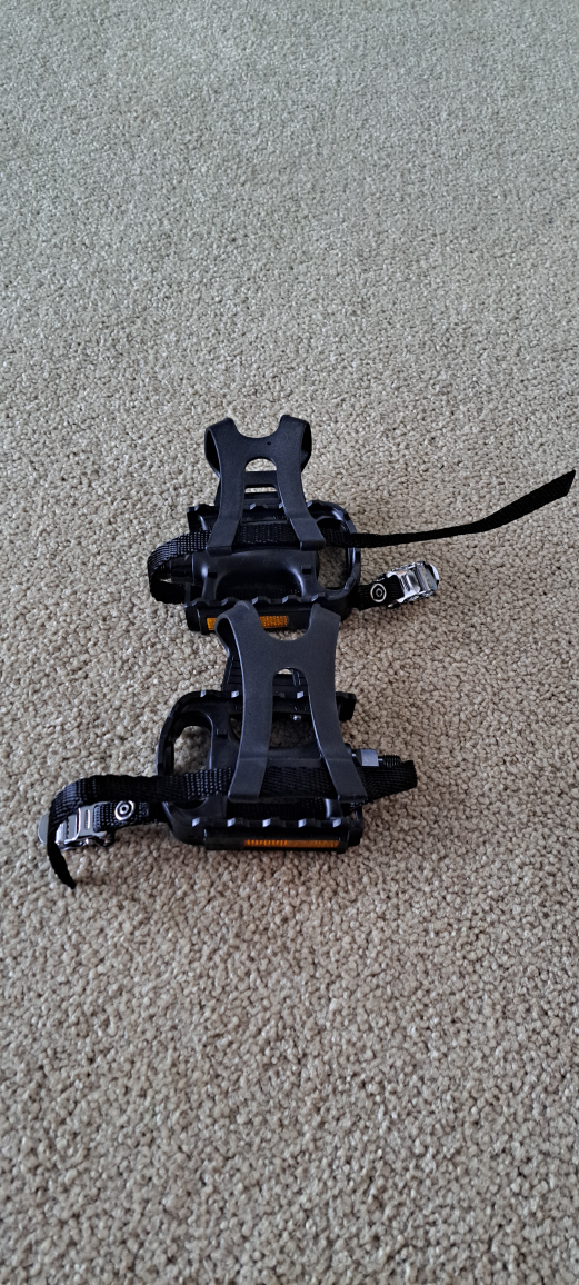 Platform bike pedals with toe cages and straps