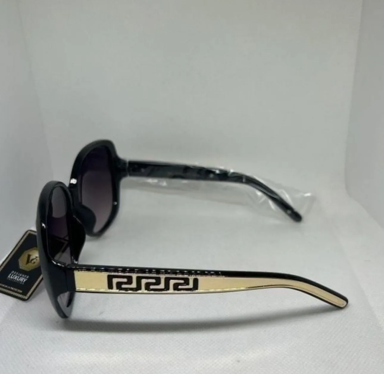 Black Sunglasses with Gold Detail image indicator(2)