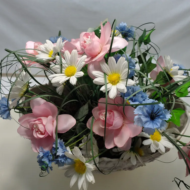 Artificial flowers in vintage planter image indicator(10)