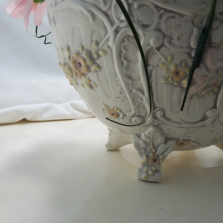 Artificial flowers in vintage planter image indicator(3)