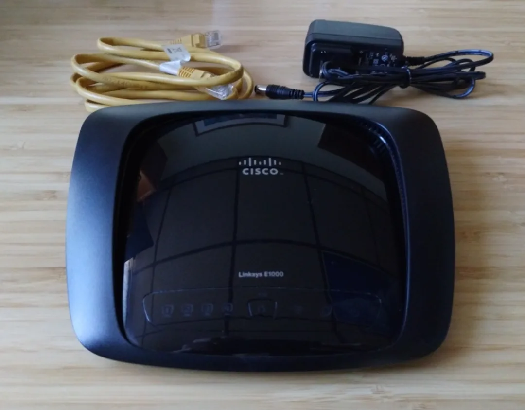 Cisco Linksys E1000 4 Port Internet Router 🧡 thumbnail