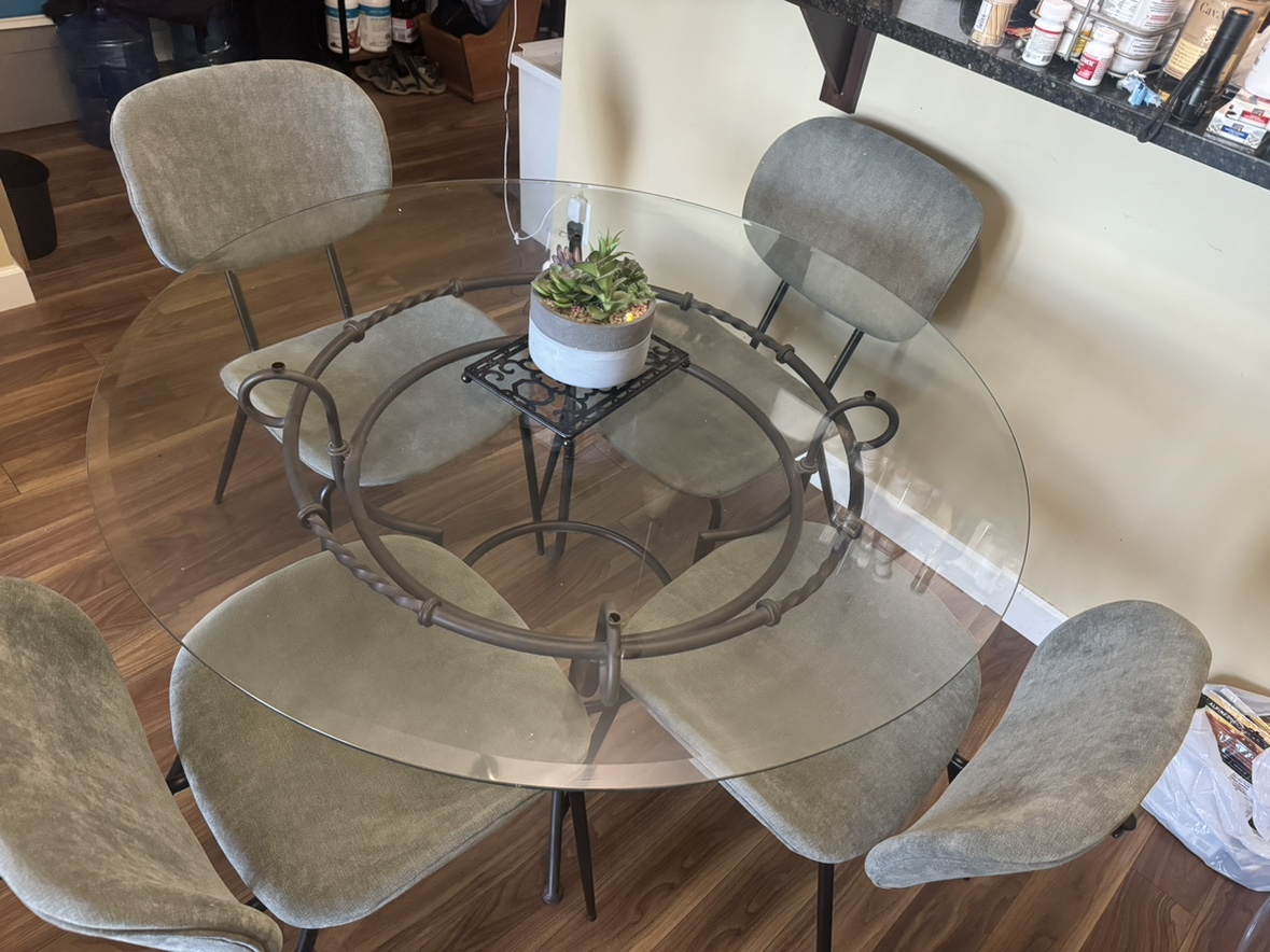 Round glass dining table with 4 chairs