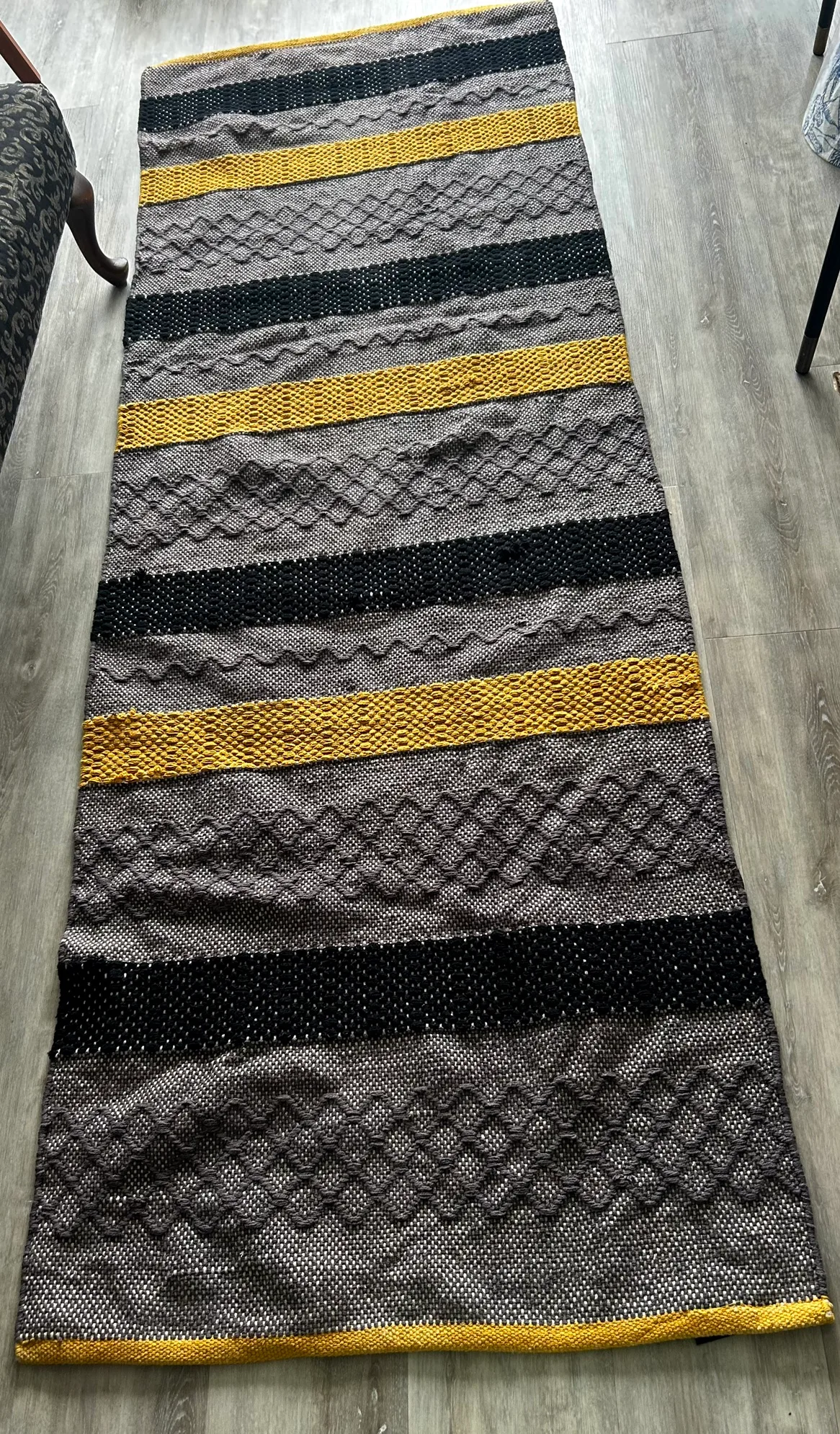 Black, grey and yellow rug