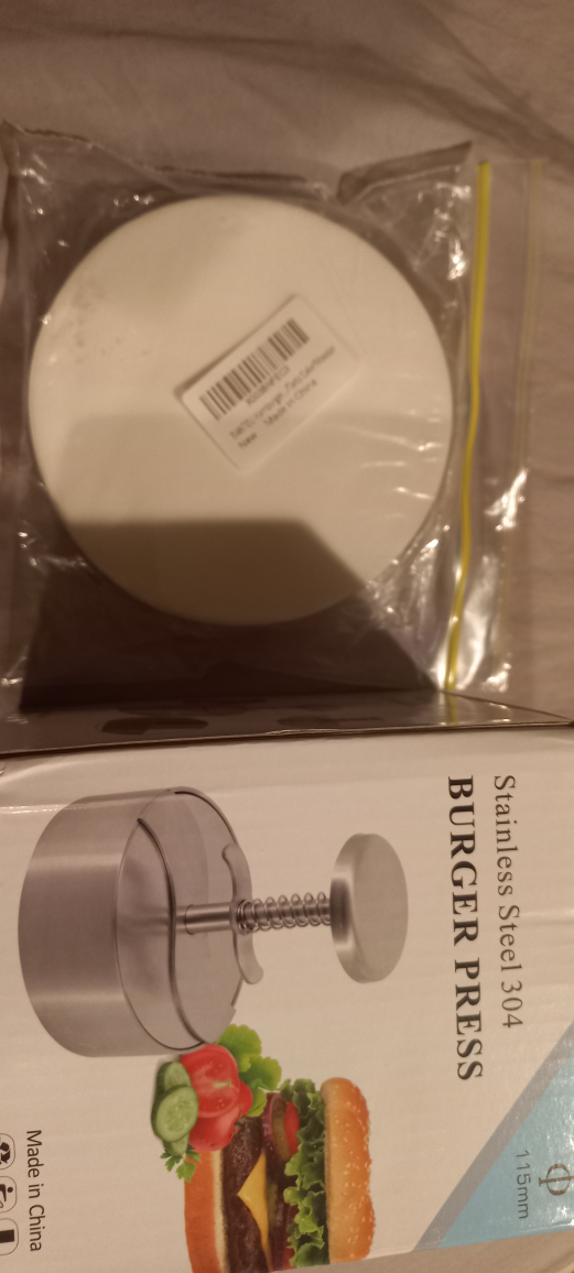 unpack box of Burger Press with the paper